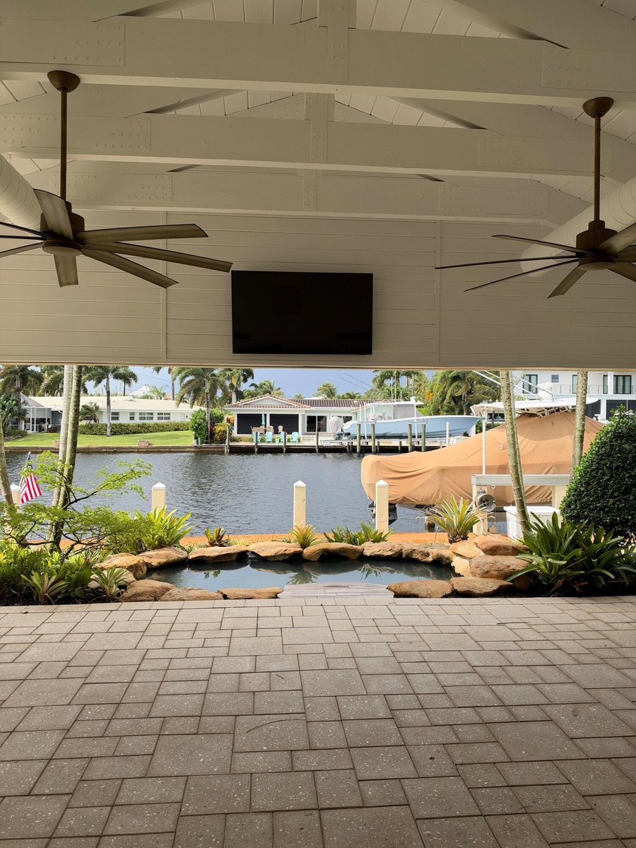 Patio with TV, roll down screens and air conditioning