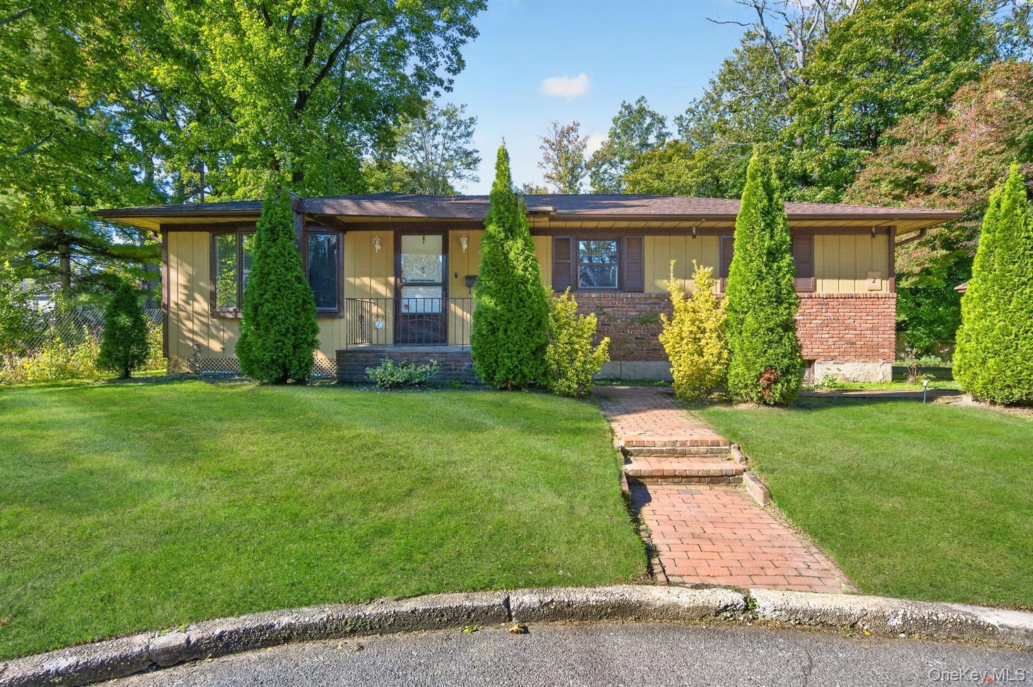 Brick walkway to the home