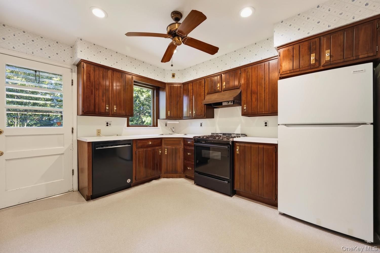 Kitchen with door to back yard