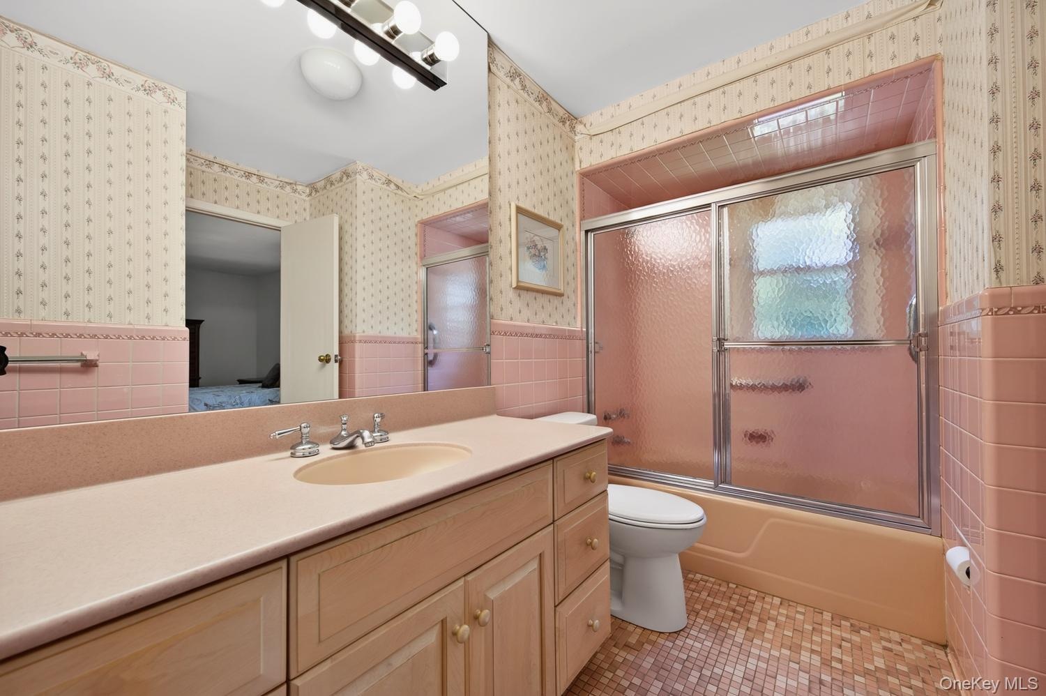 Bathroom with tub and shower