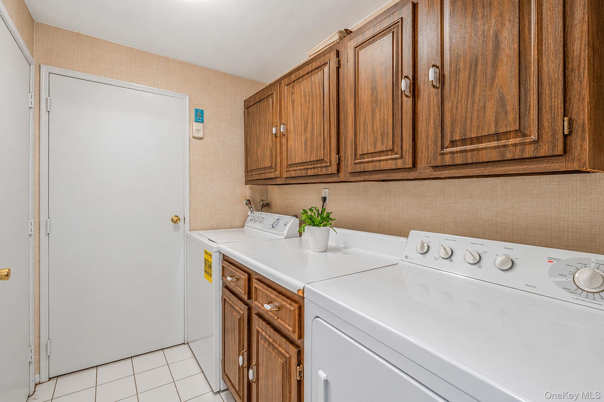 First Floor Laundry, Cabinets for Storage, Access to 2 Car Garage