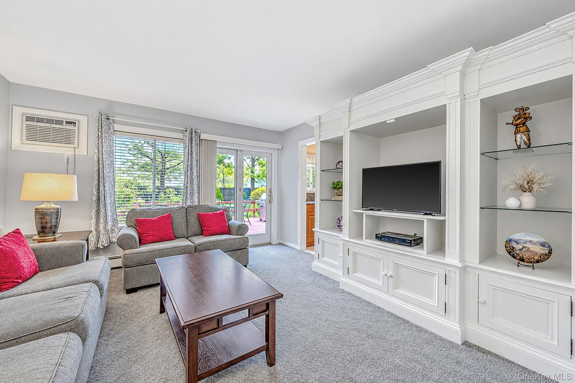 Den with Built-In Entertainment Center, Slider, Open to Kitchen and Entry Foyer