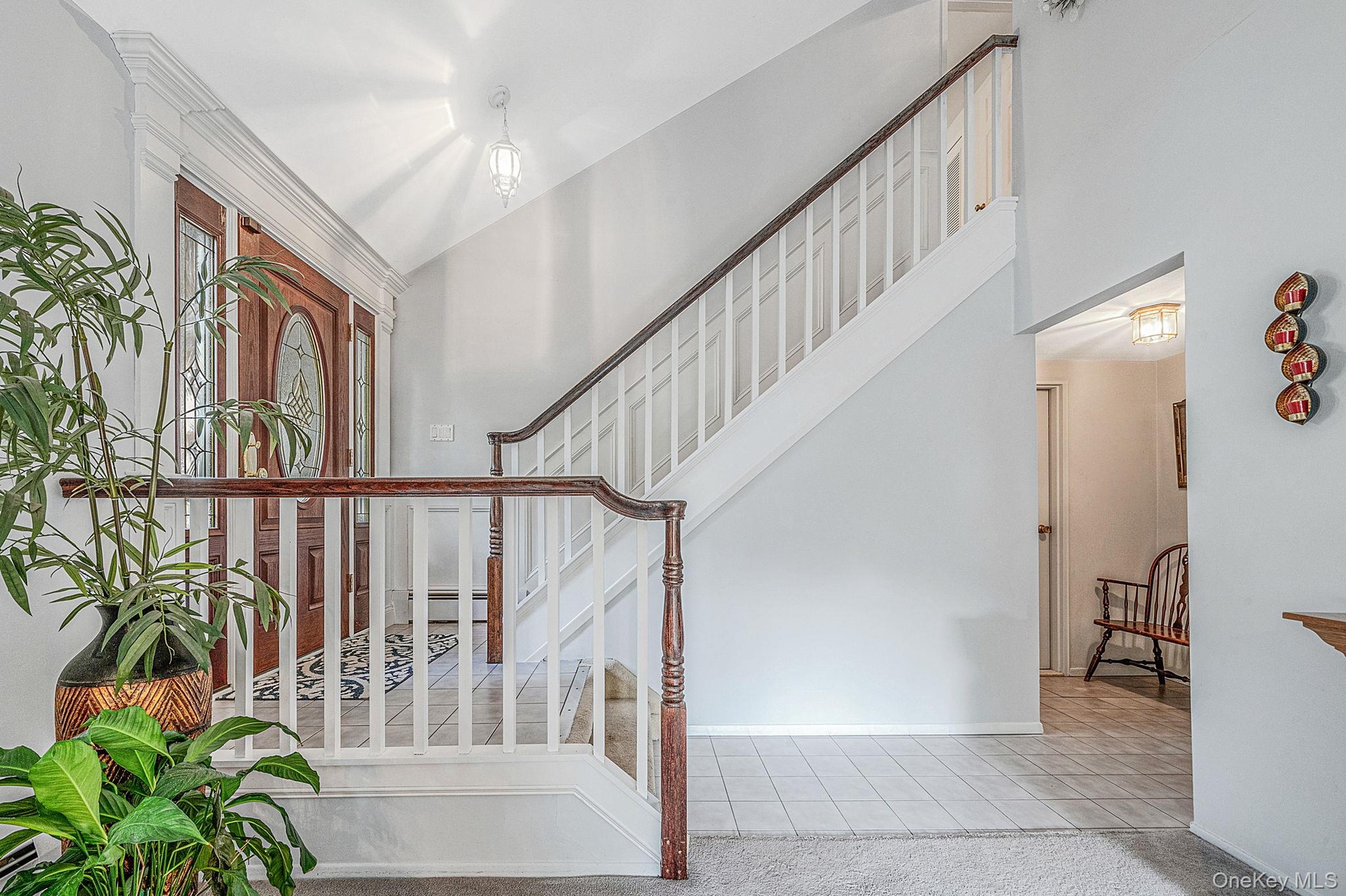 Entrance Foyer, Wainscoting Lined Staircase