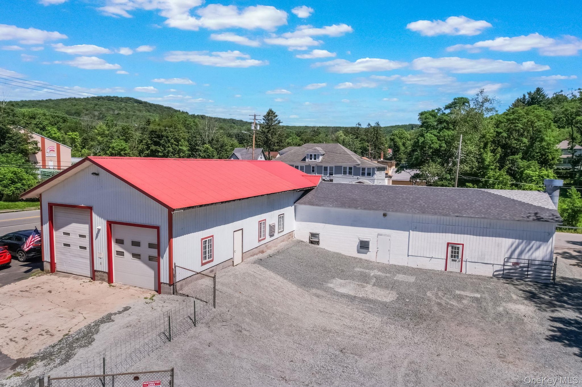 Aerial view of property and surrounding area