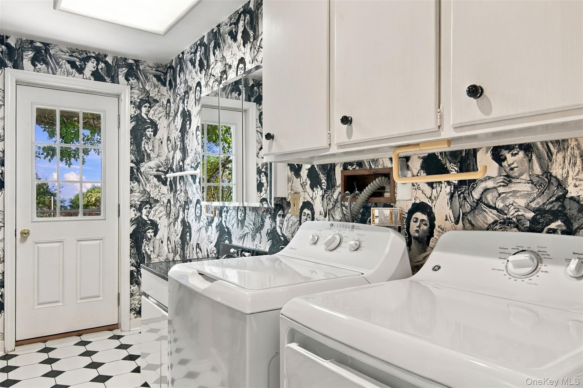 Bathroom/Laundry room with entrance to outside