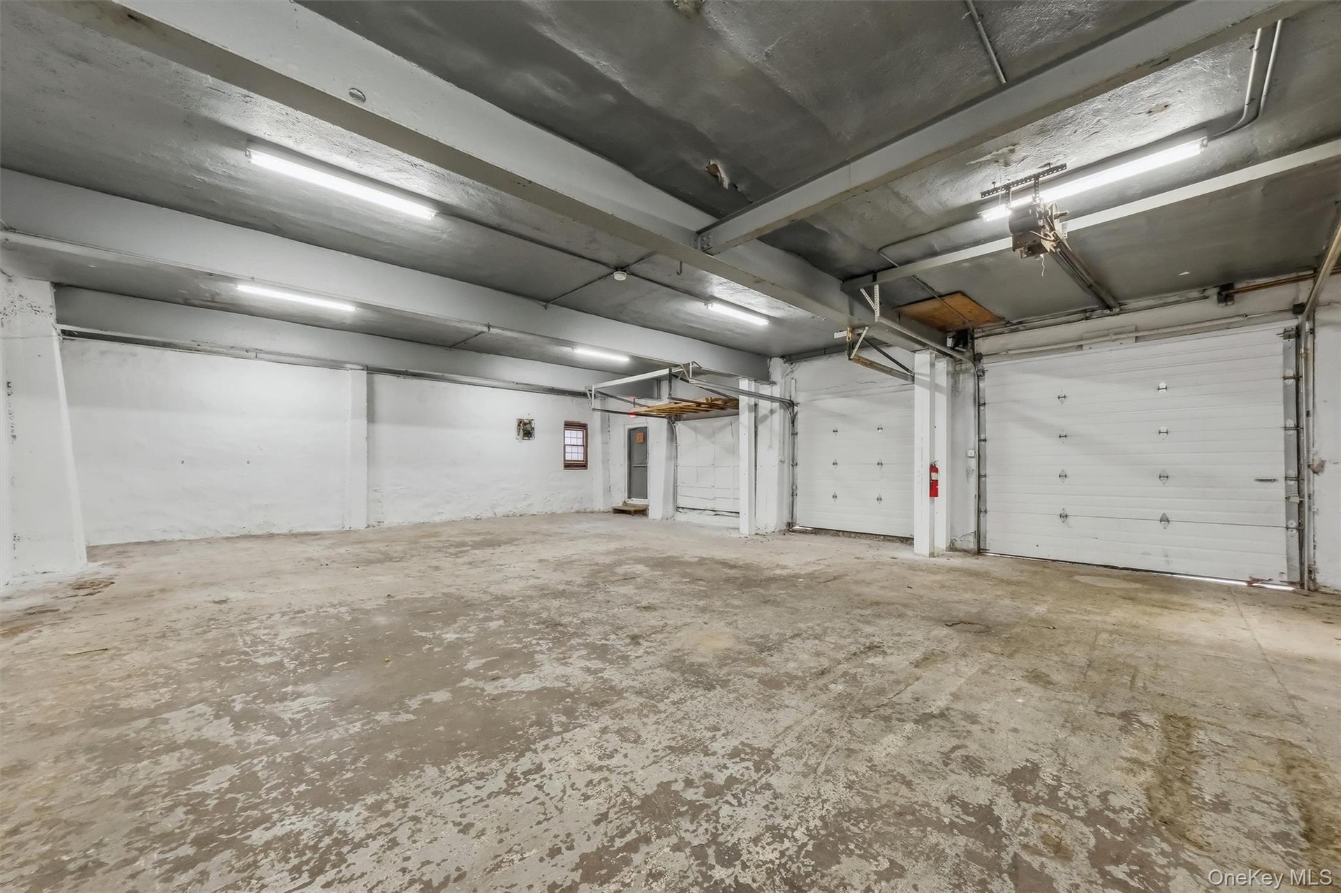 First Floor with overhead Garage Doors