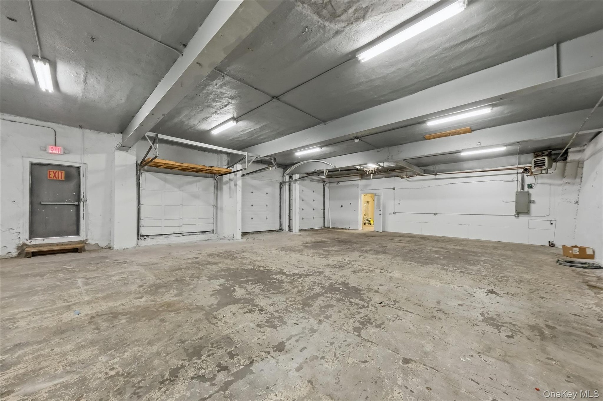 First Floor with overhead Garage doors