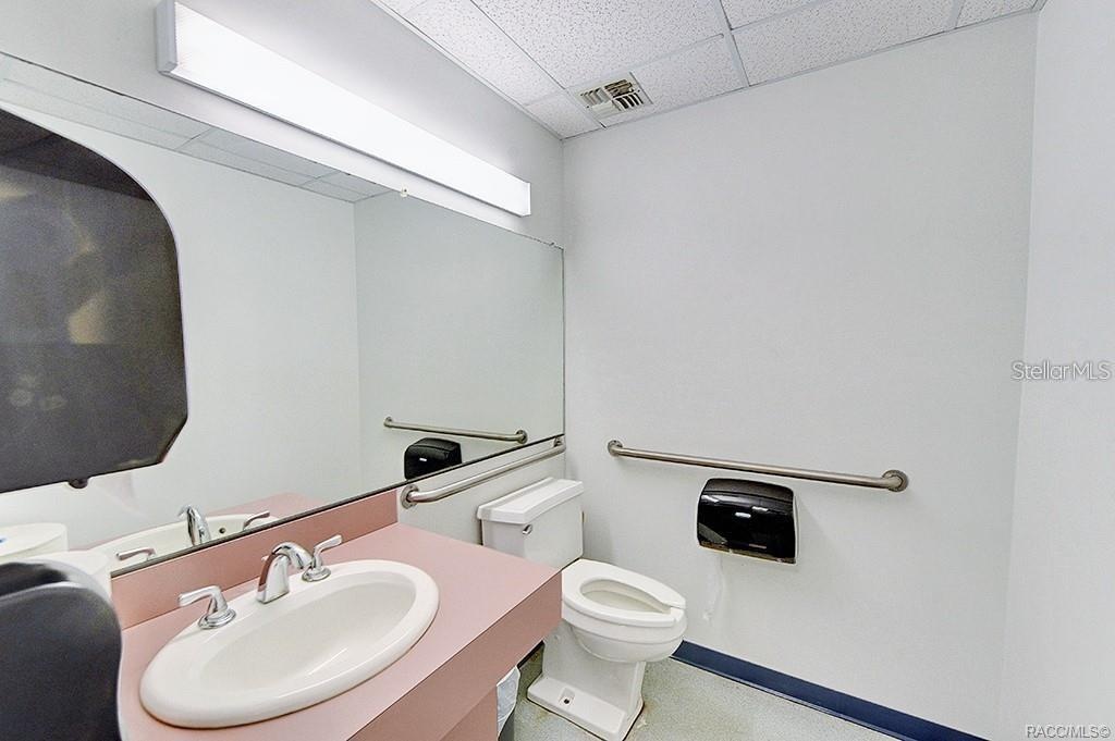 First restroom with existing fixtures.