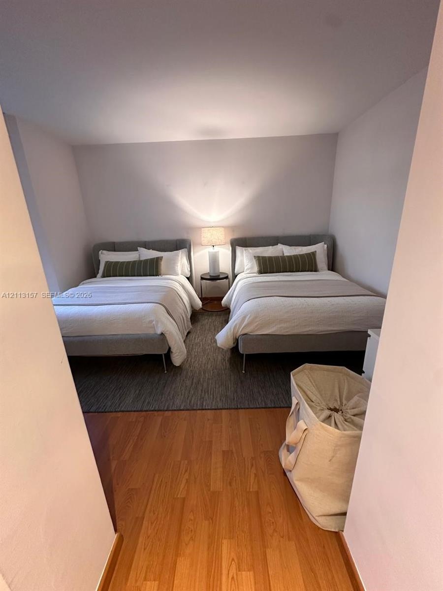 Wood-finish flooring and neutral wall paint