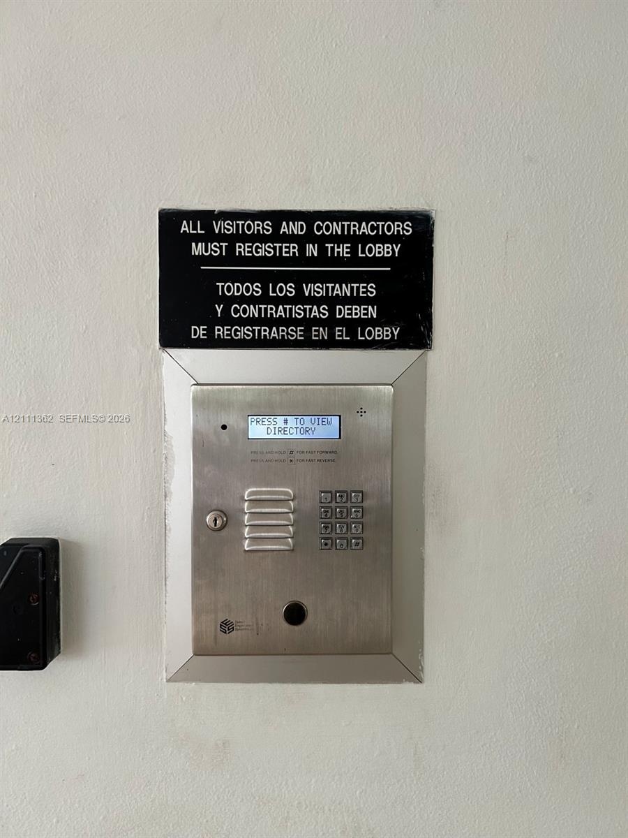 Stainless steel building intercom system featuring a digital directory display and integrated numerical keypad