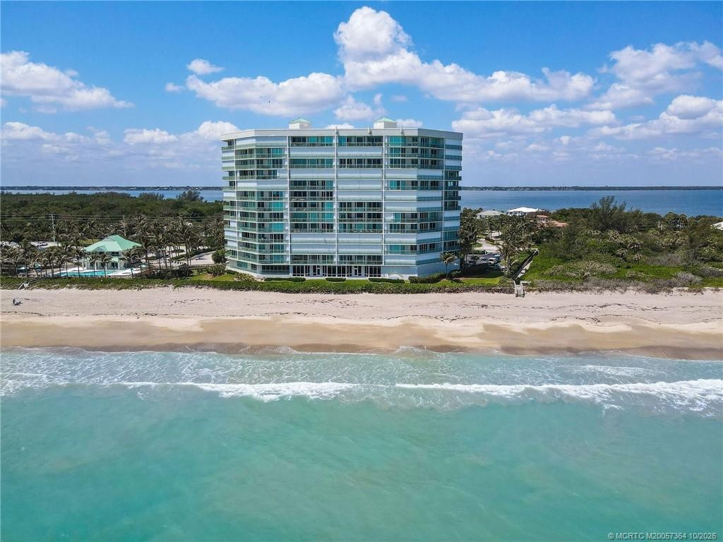 Stunning aerial view of Regency Island Dunes, perfectly positioned along the pristine beaches of Hutchinson Island with the Intracoastal Waterway to t