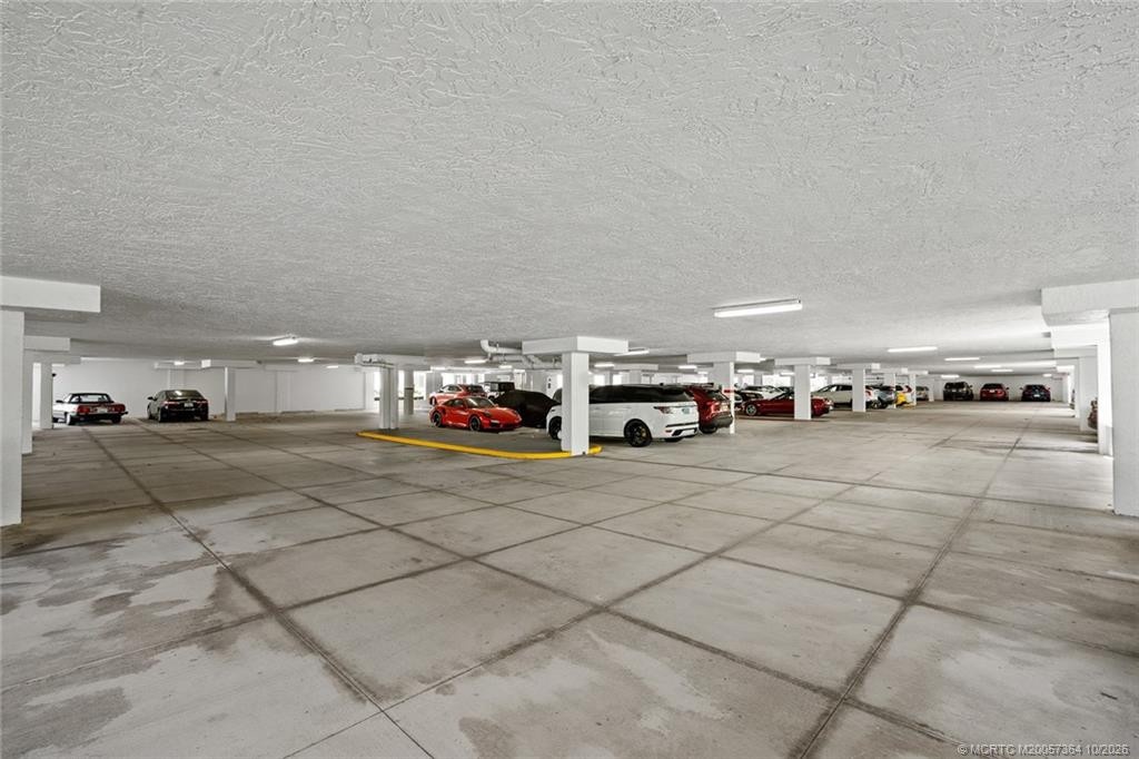 Convenient covered parking beneath the building, providing protection from the elements and easy access to the residences.