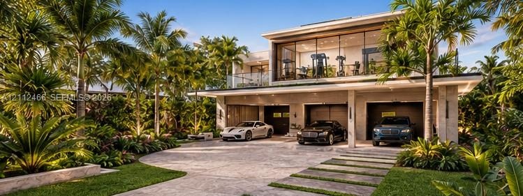 Modern exterior featuring a three-car garage, floor-to-ceiling glass windows, a glass-panel balcony railing, and natural stone paver driveway with int