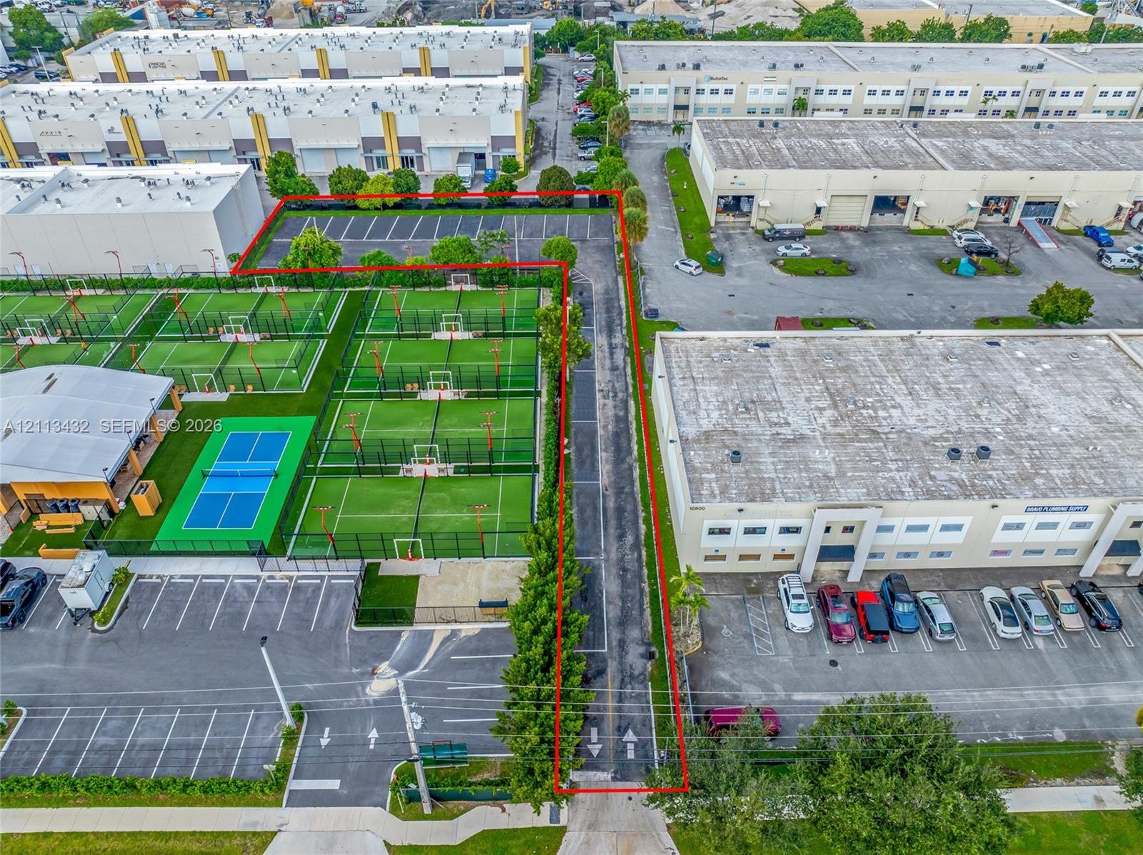 Paved parking area, and perimeter landscaping