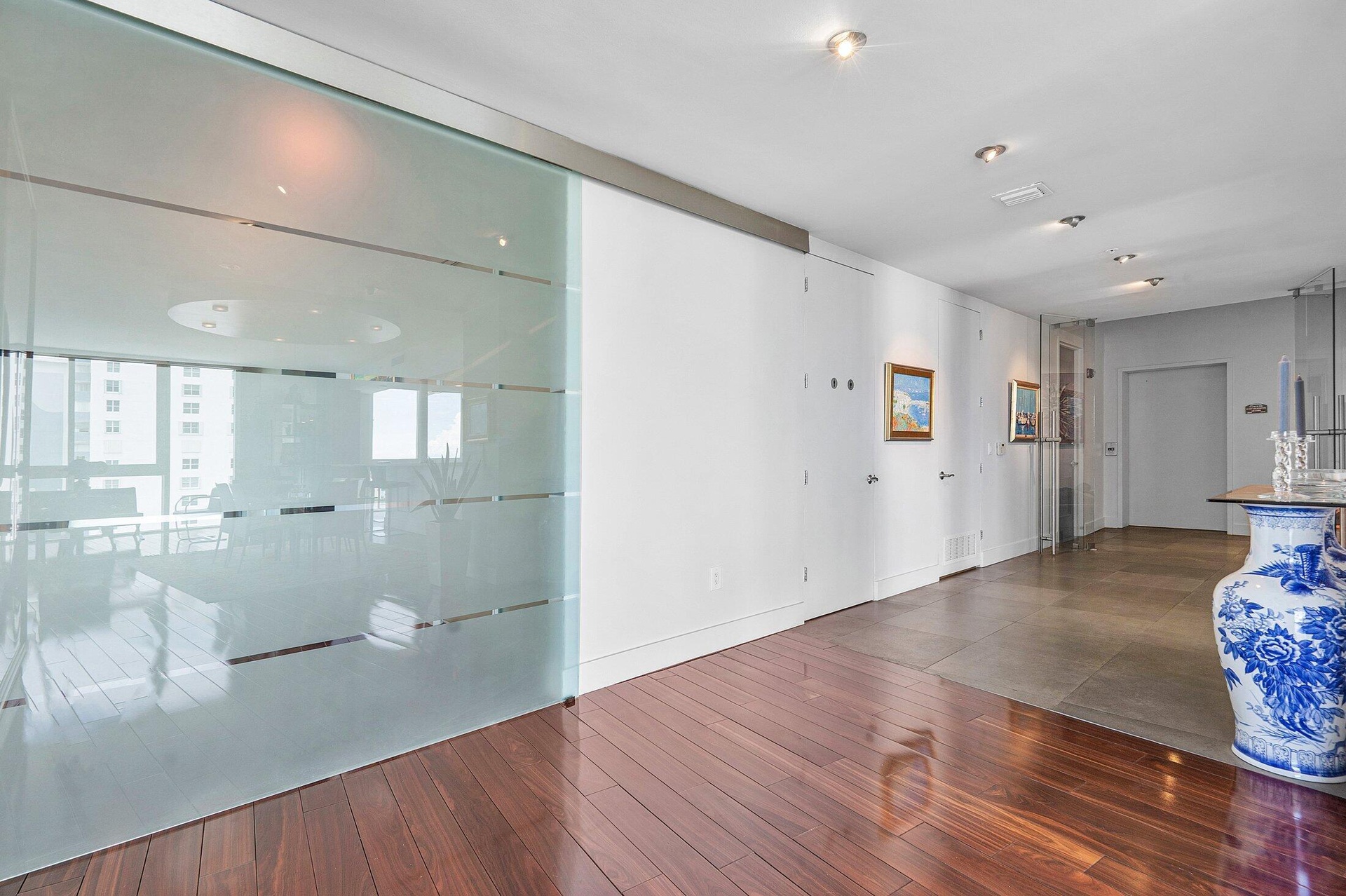 Entrance Hallway with Sliding Glass Door into Owner's Suite