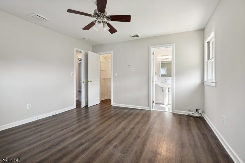 PRIMARY BEDROOM w/ CLOSET