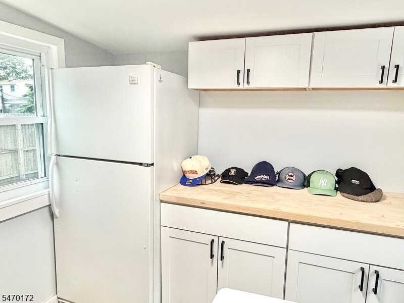 laundry room cabinets/fridge