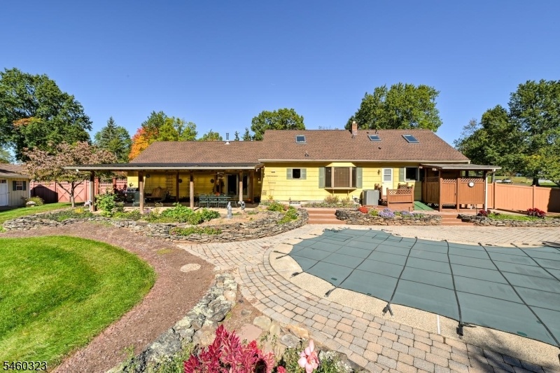 Back view of home with Pool