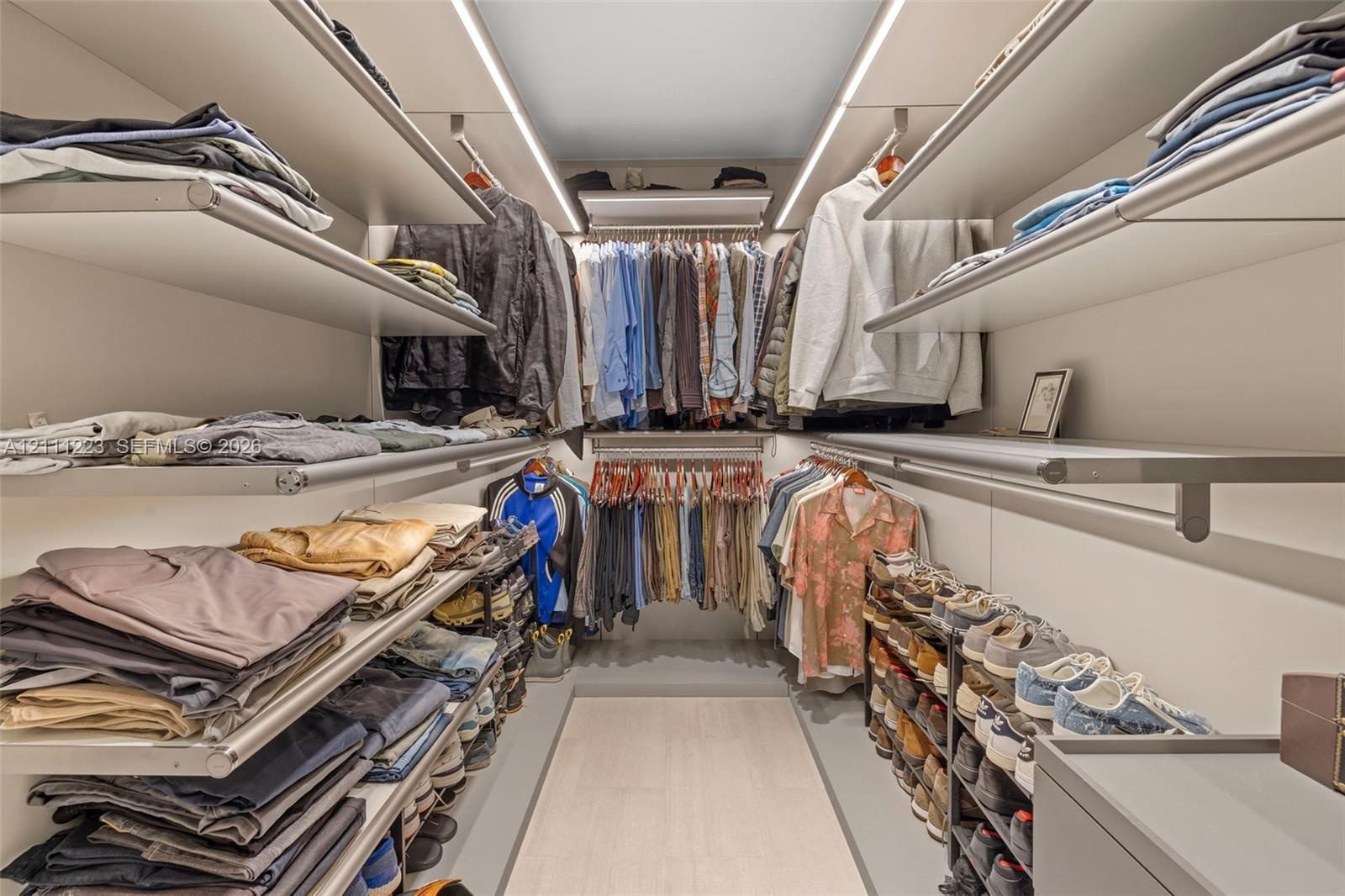 Den converted into custom walk-in closet for primary