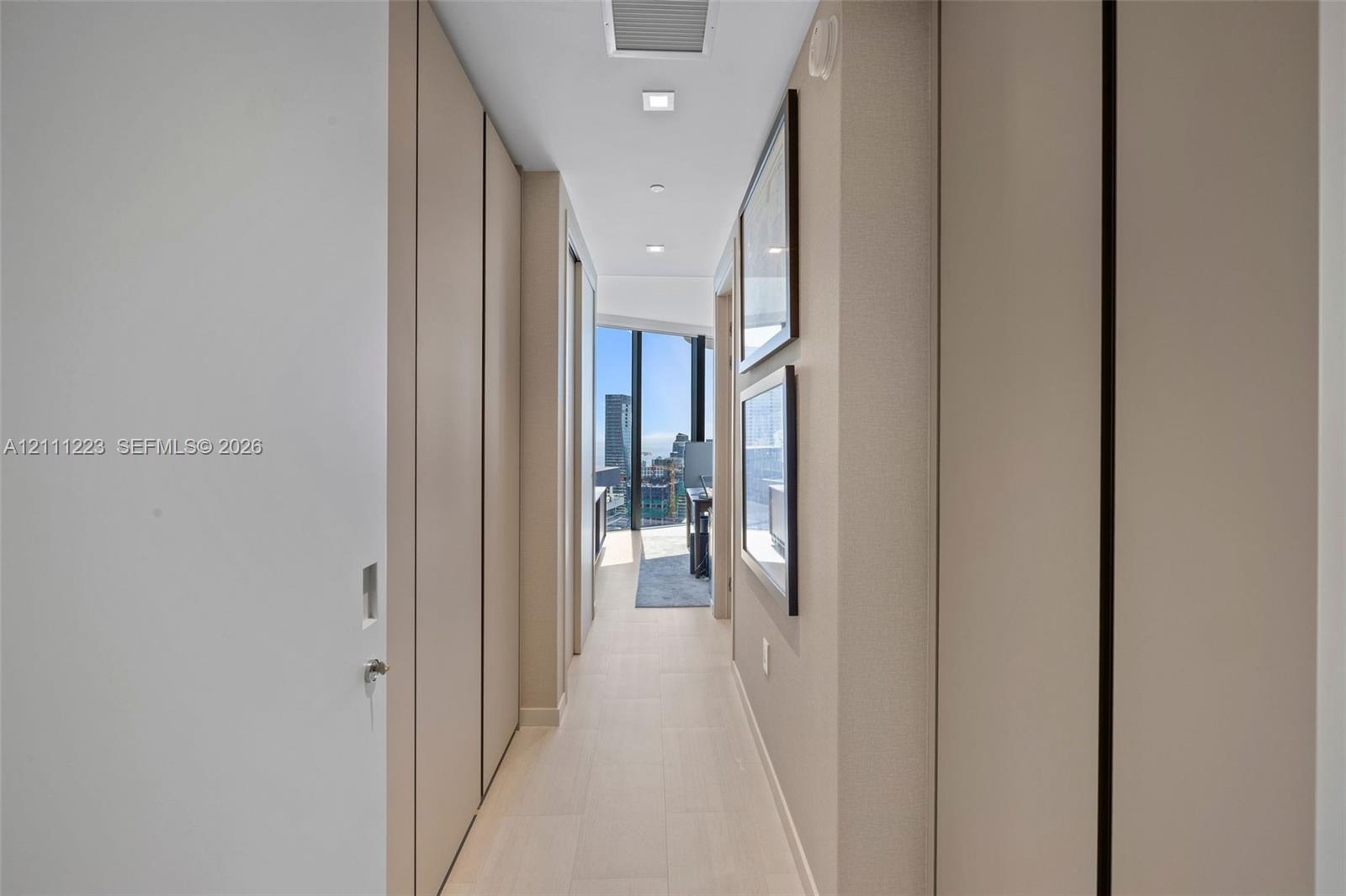 Entrance to 3rd bedroom - closets left & right side