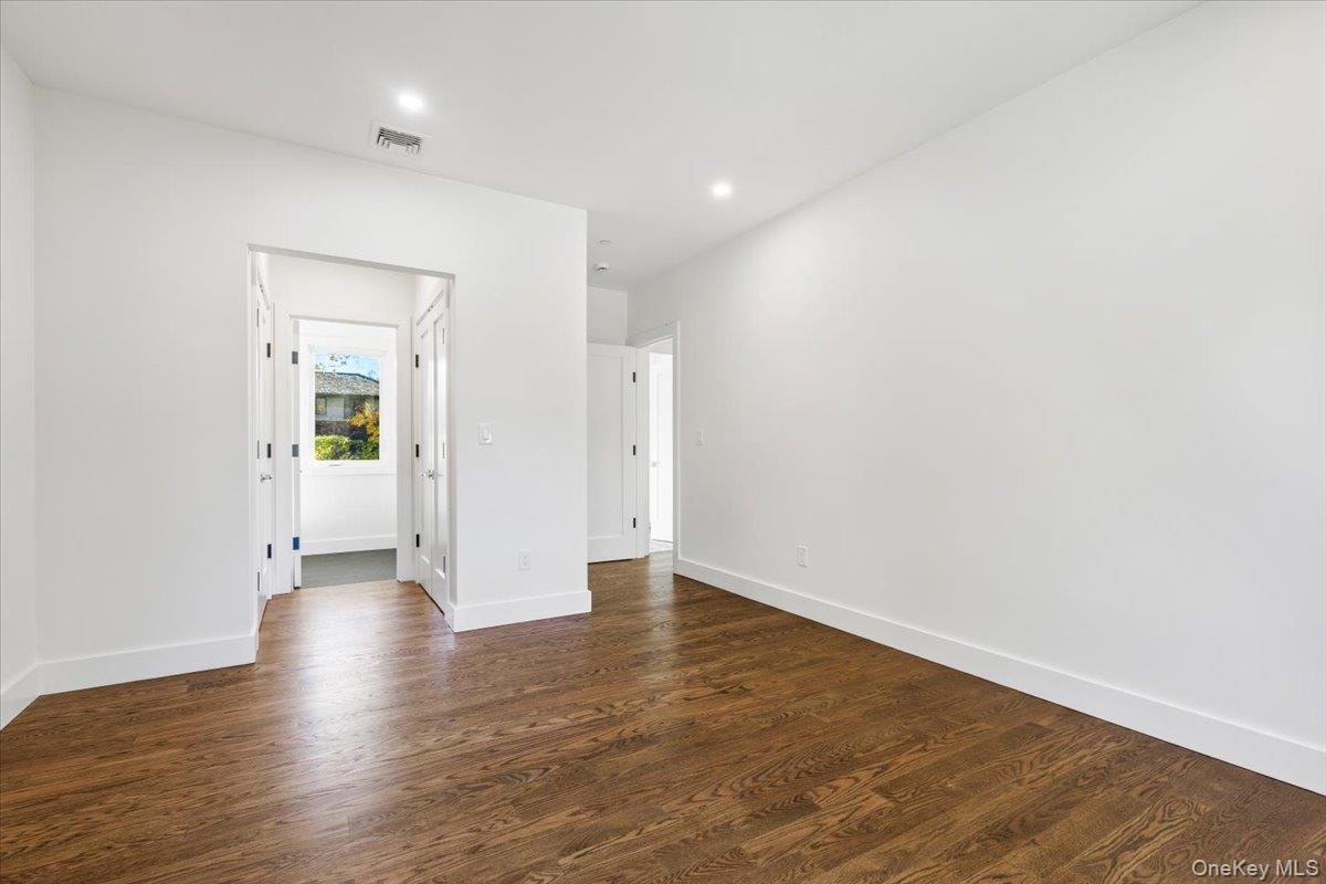 4th bedroom, double closets, view to en suite bathroom