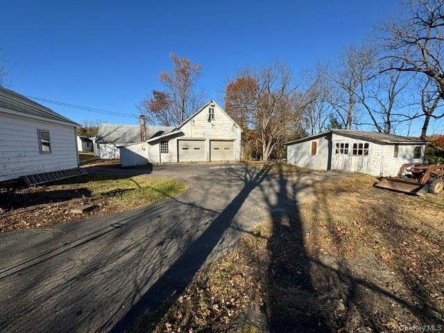 Showing 3 of the 5 structures on the property.