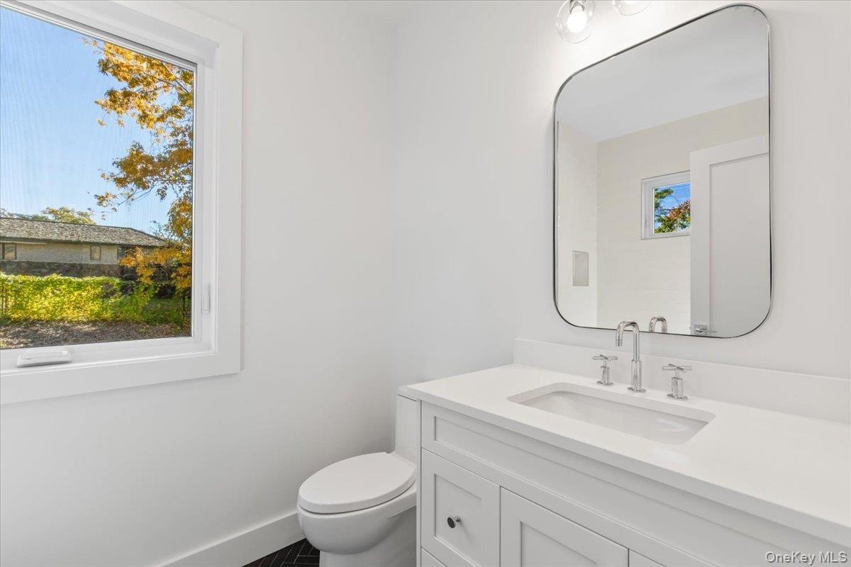 En suite bathroom for 4th bedroom with tub and shower