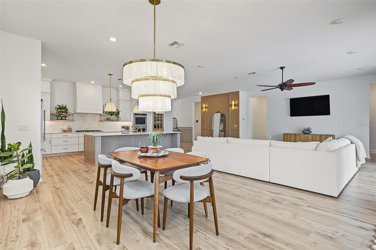 Dining nook with designer light fixture