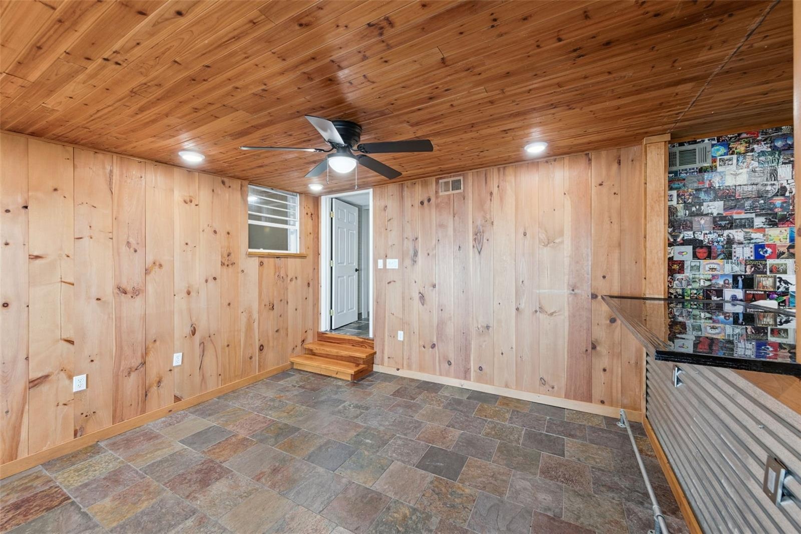 Game room / pub has plenty of room for your dart boards, sitting area, video games or whatever you dream up!