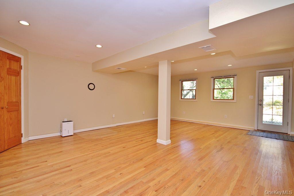 Lower level family room with door out back