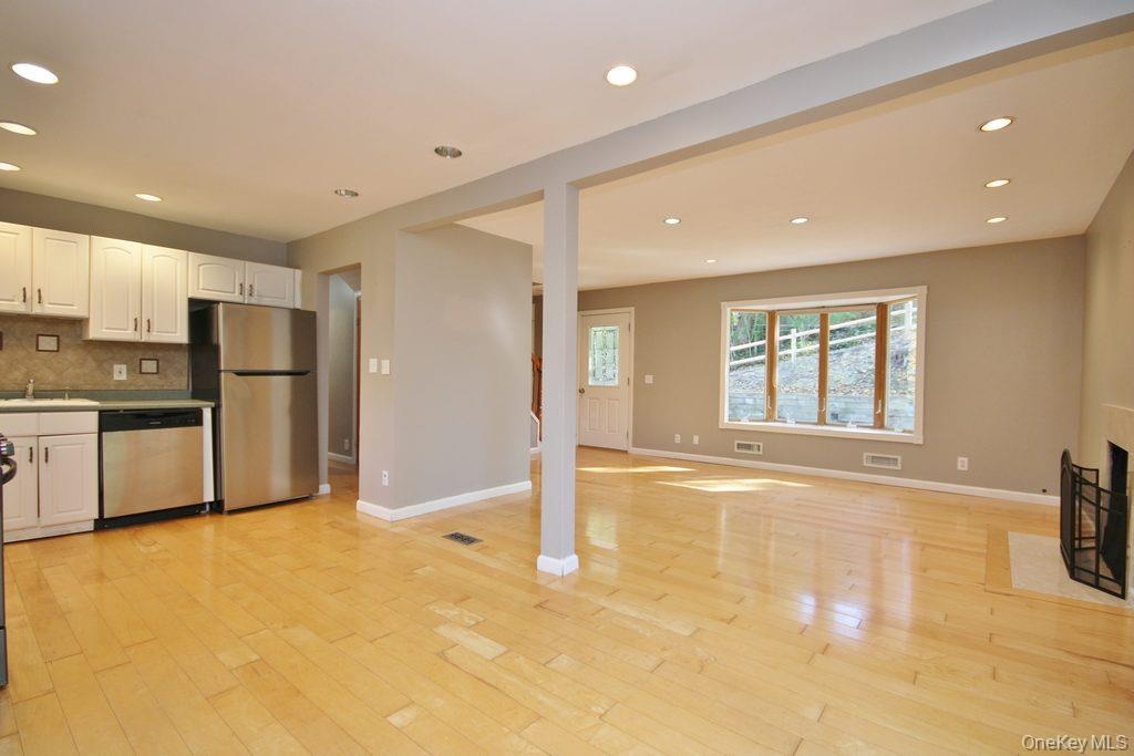 View from dining room of kitchen and living room.