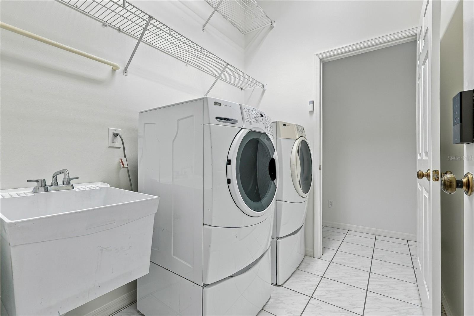 Interior laundry room and utility sink.