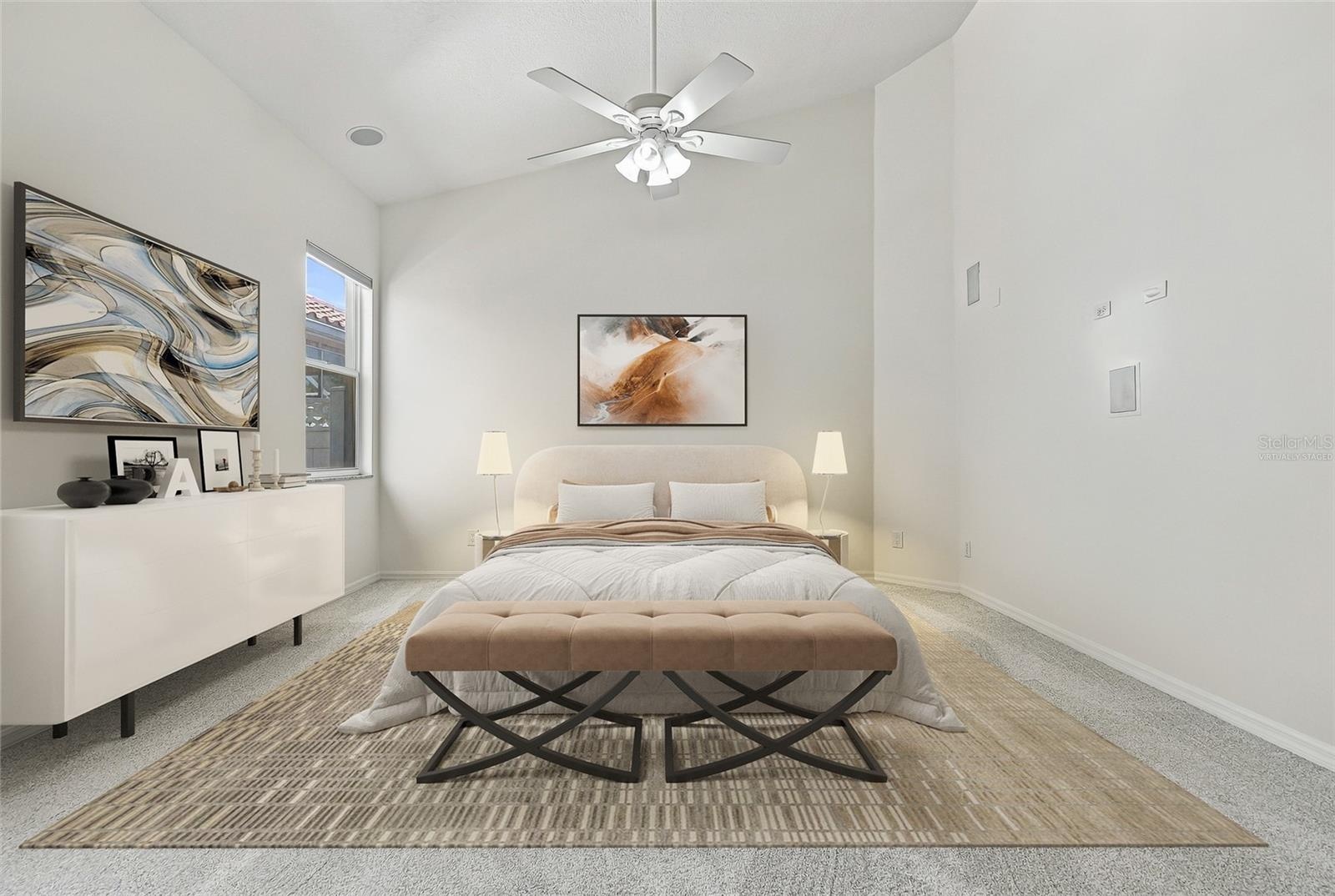 Primary bedroom has two huge walk in closets. Virtually staged.