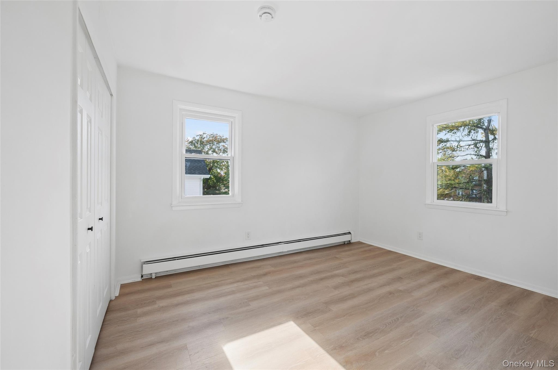 View of unfurnished bedroom three