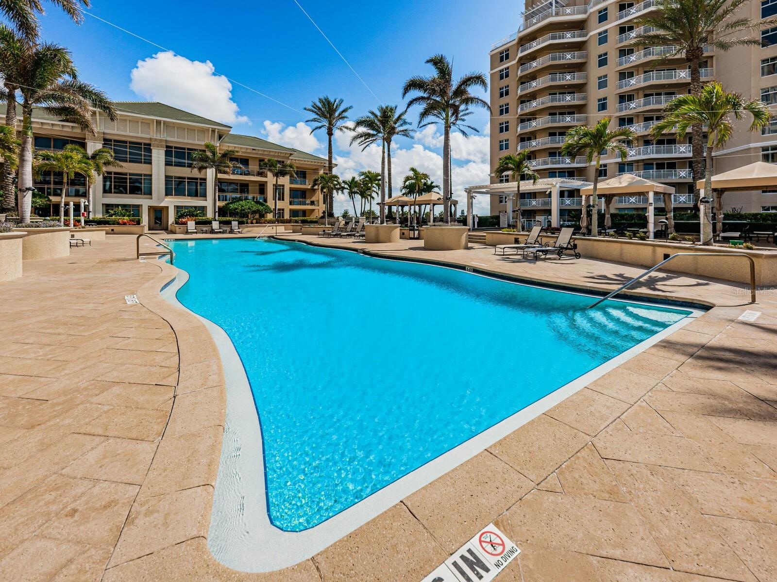 Amenities include Gated Entry, Courteous Concierge, Gulf Front Heated Pool with Cabanas, Fitness Center, Social Library and more!
