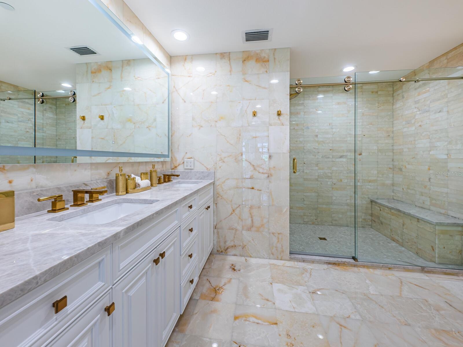 Master Bath Retreat with Surround Marble, Natural Onyx & Spa Finishes.