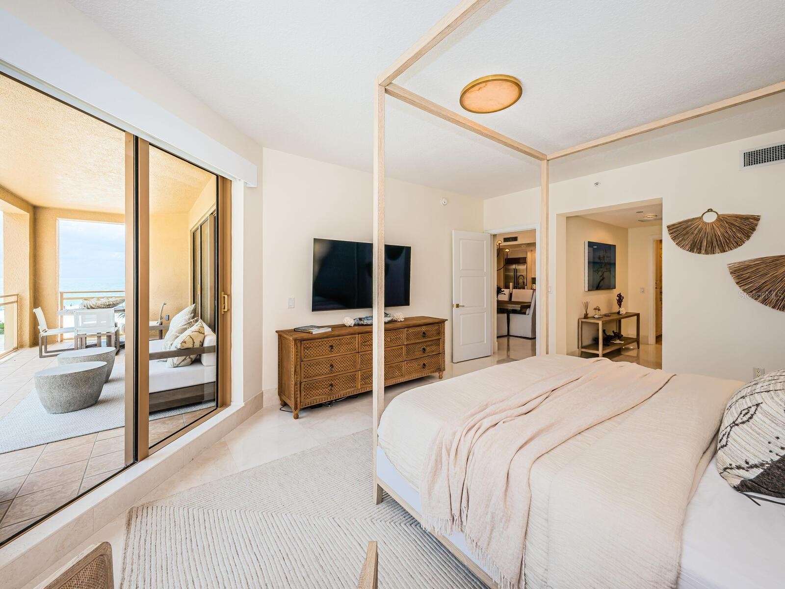 Master Suite Features Opulent Bath Retreat, Walk In Closet, Terrace Access & Aquamarine Seascape Views!