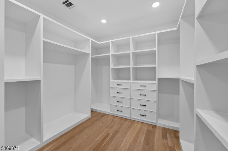 Primary closet with organizer