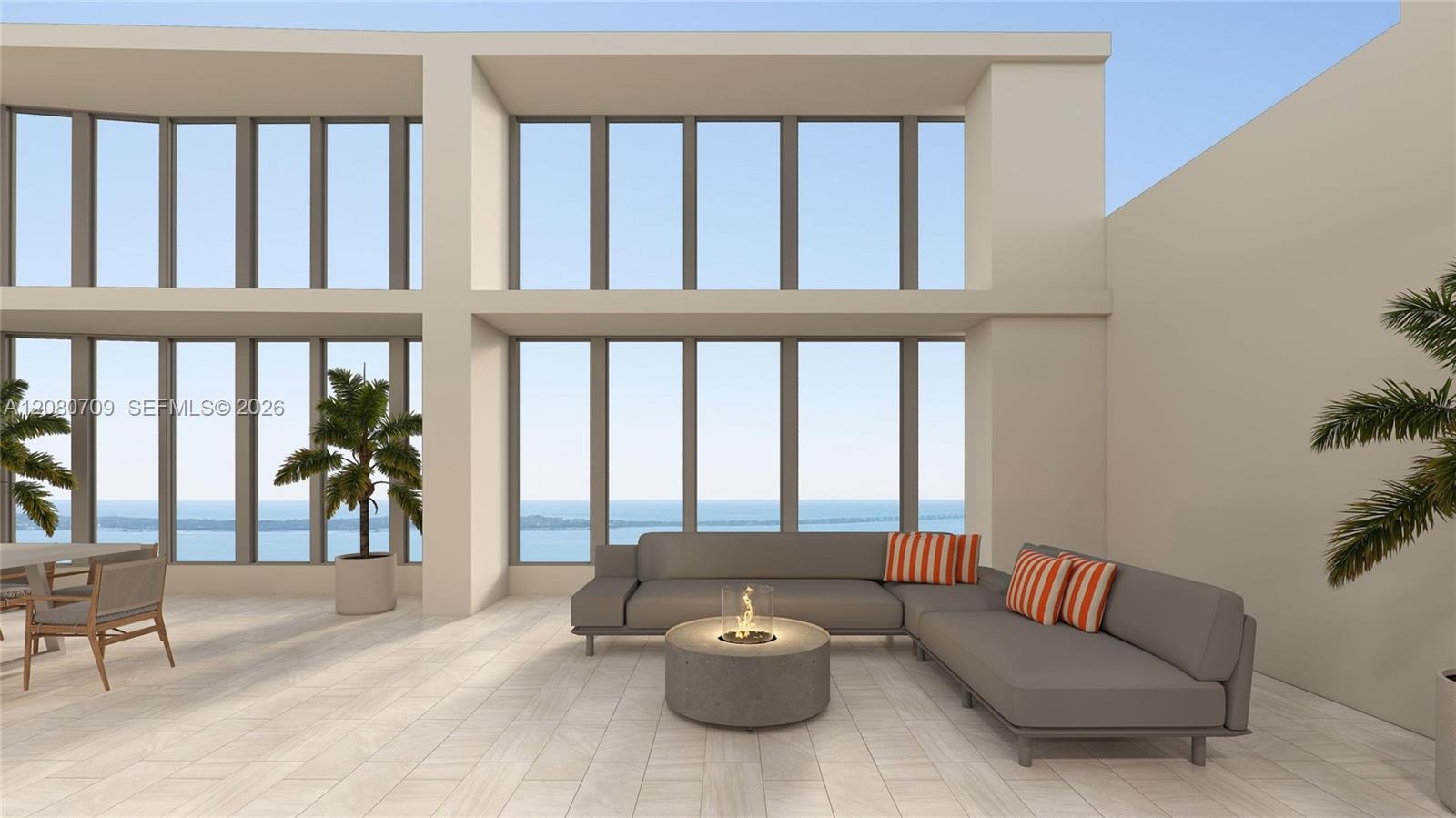 Expansive covered terrace featuring floor-to-ceiling windows, light-toned tiled flooring, and structural pillars