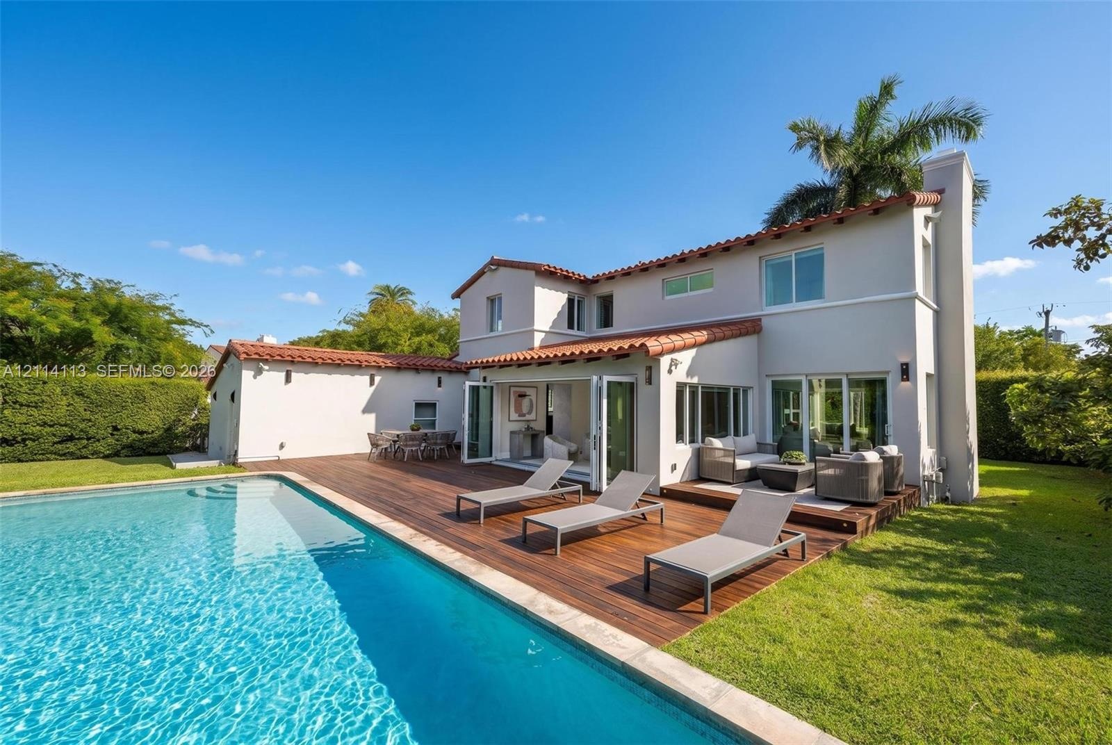 oversized rectangular in-ground swimming pool