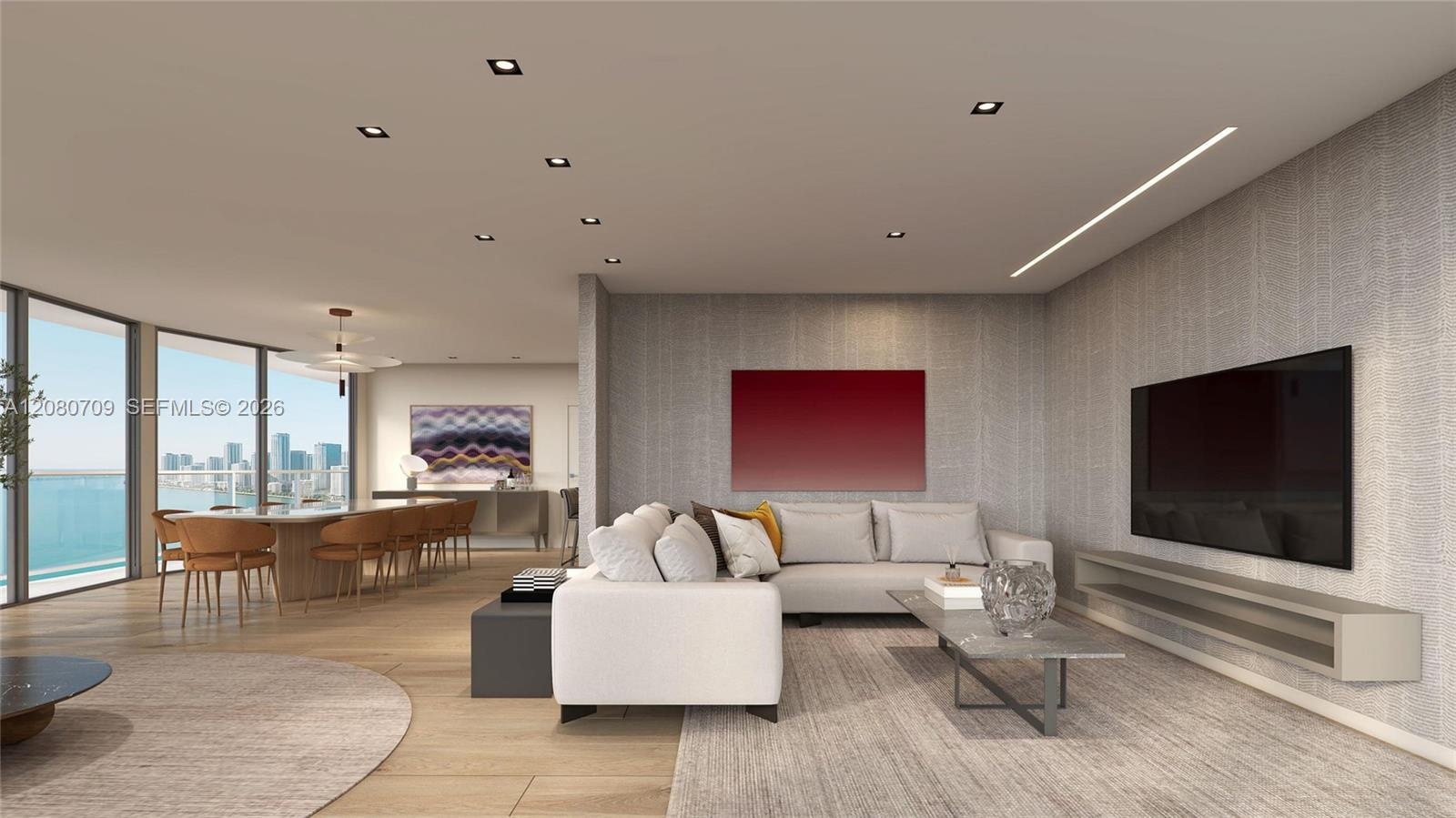 Open-concept interior featuring large-format tile flooring, recessed ceiling lighting, light wood-finish wall paneling, and a wall-mounted custom medi