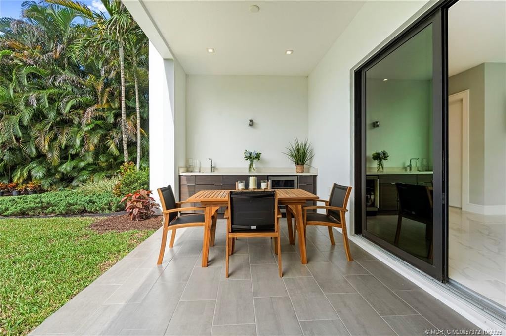 Patio off Down Stairs Living Room with Summer Kitchen