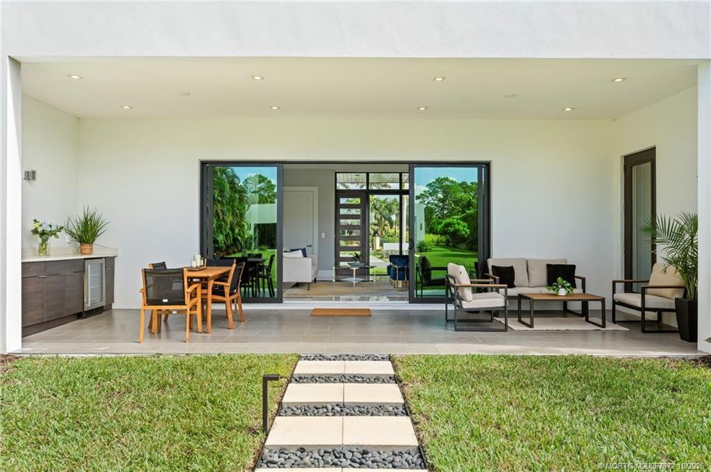 Patio off Down Stairs Living Room with Summer Kitchen