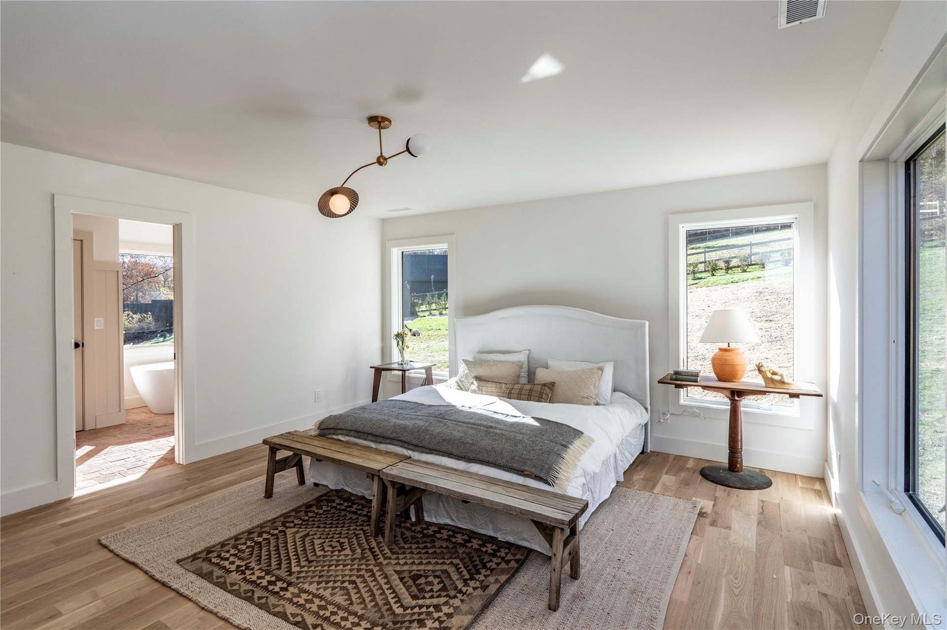 Brass Light Fixture, White Oak Wide Board Floors & 4 Large Windows