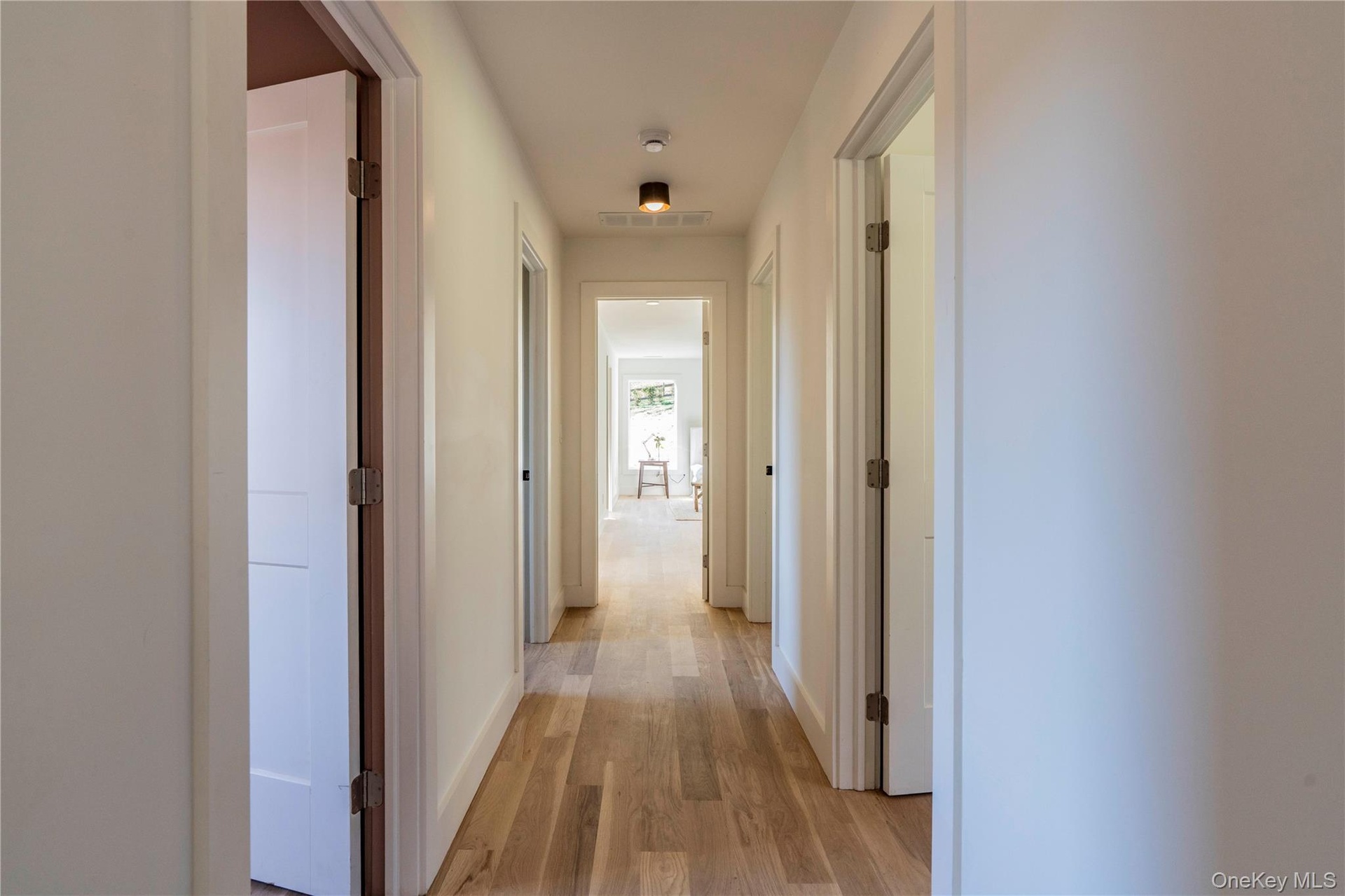 Hallway Leads to 3 Bedrooms, 2 Full Bathrooms, Laundry Room & Office