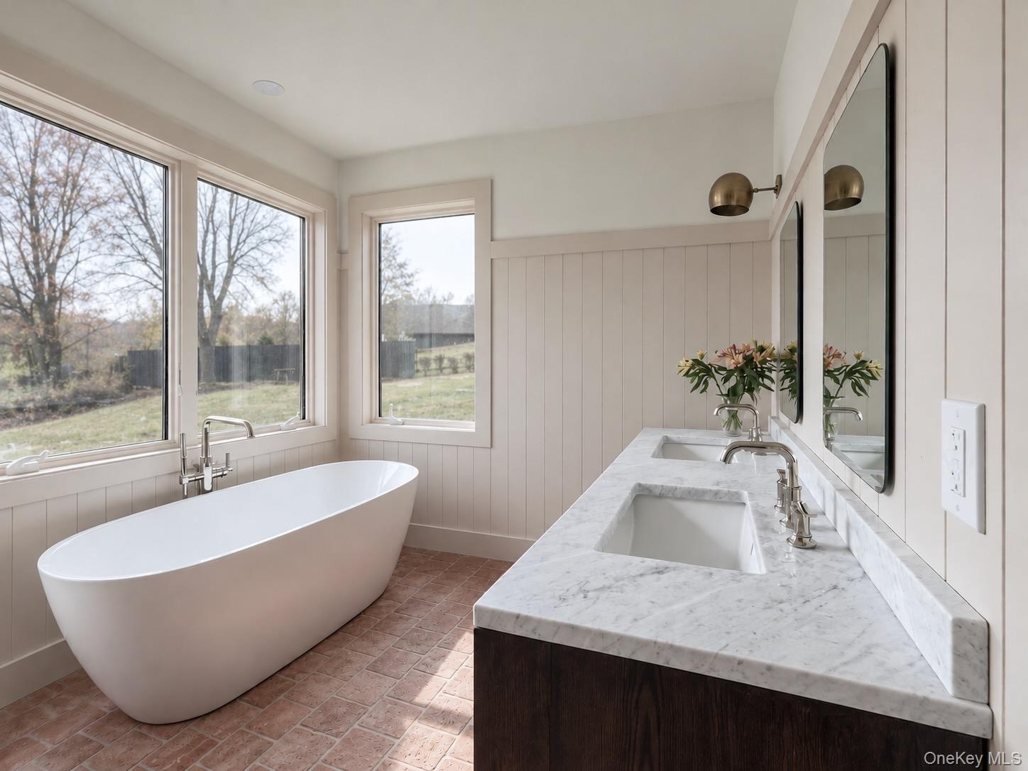 Large Soaking Tub, Terra Cotta Tile Floors & Brass Lighting Fixtures