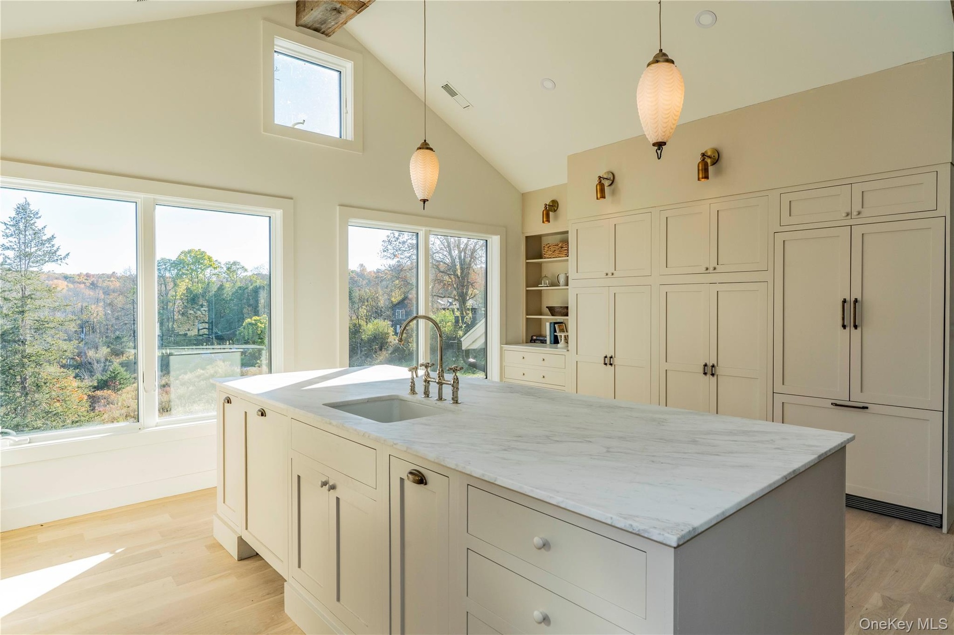 Custom Made Wood Painted Cabinetry with Built-in Appliances & Shelving