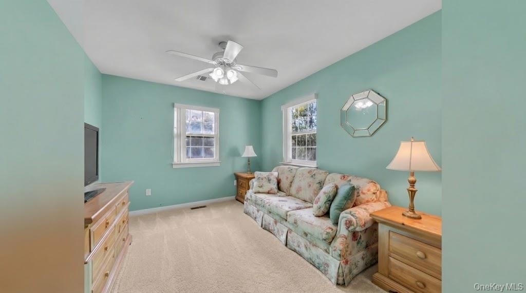This photo is digitally enhanced to reflect new carpet.