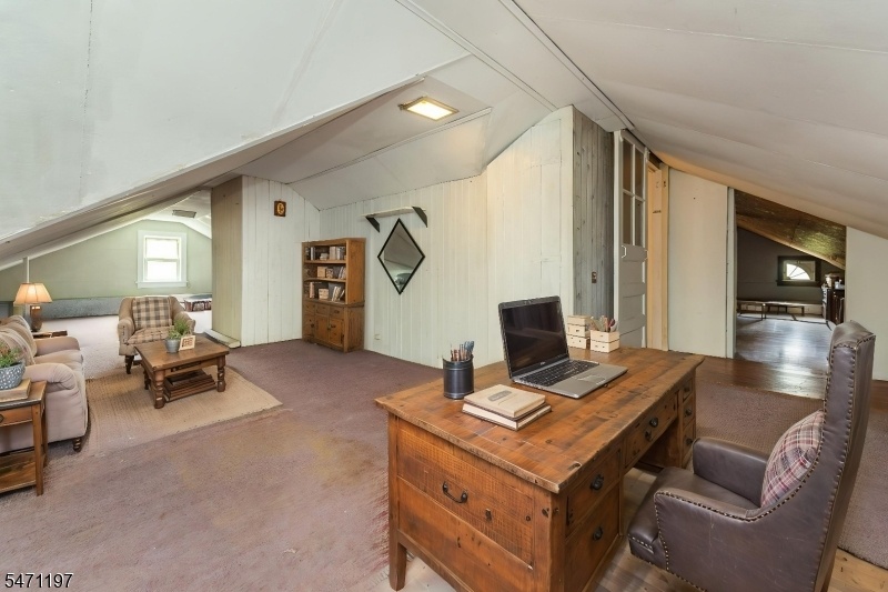 Walkup attic virtually staged