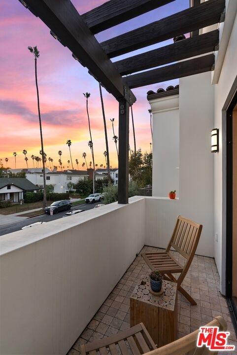Primary balcony at dusk